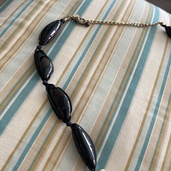 Vintage Chicos black long necklace with nuts and brass wrapped pieces of bone - Picture 9 of 12